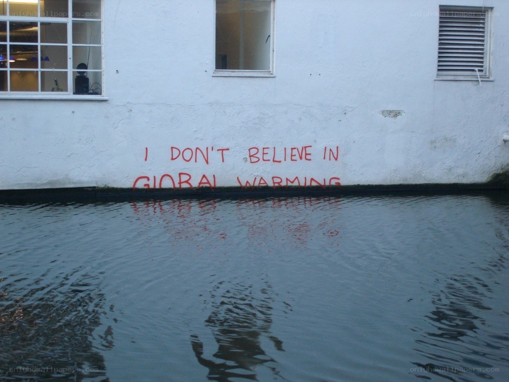 Global warming graffiti on flooded wall