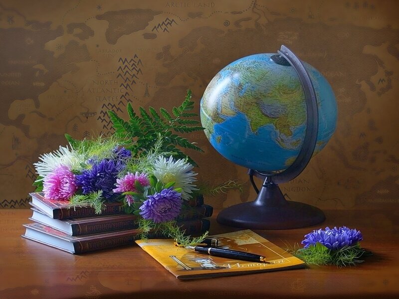 Globe and Flowers on Table