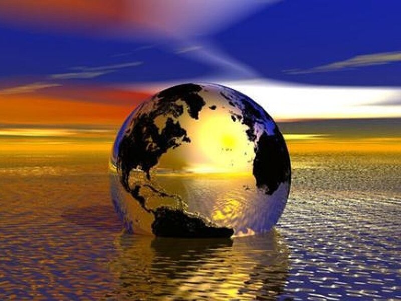 globe at sunset over water