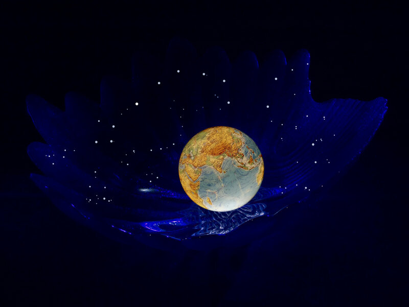 Globe in Blue Bowl