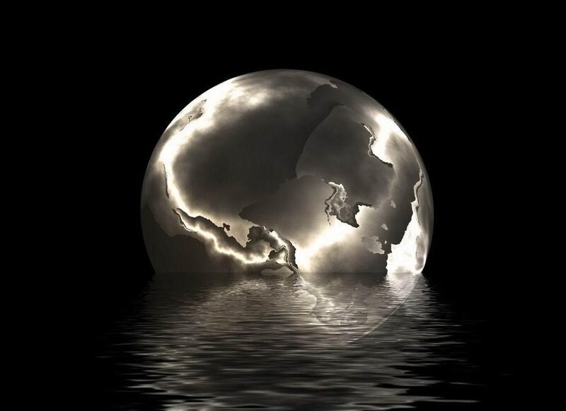 globe in reflective water