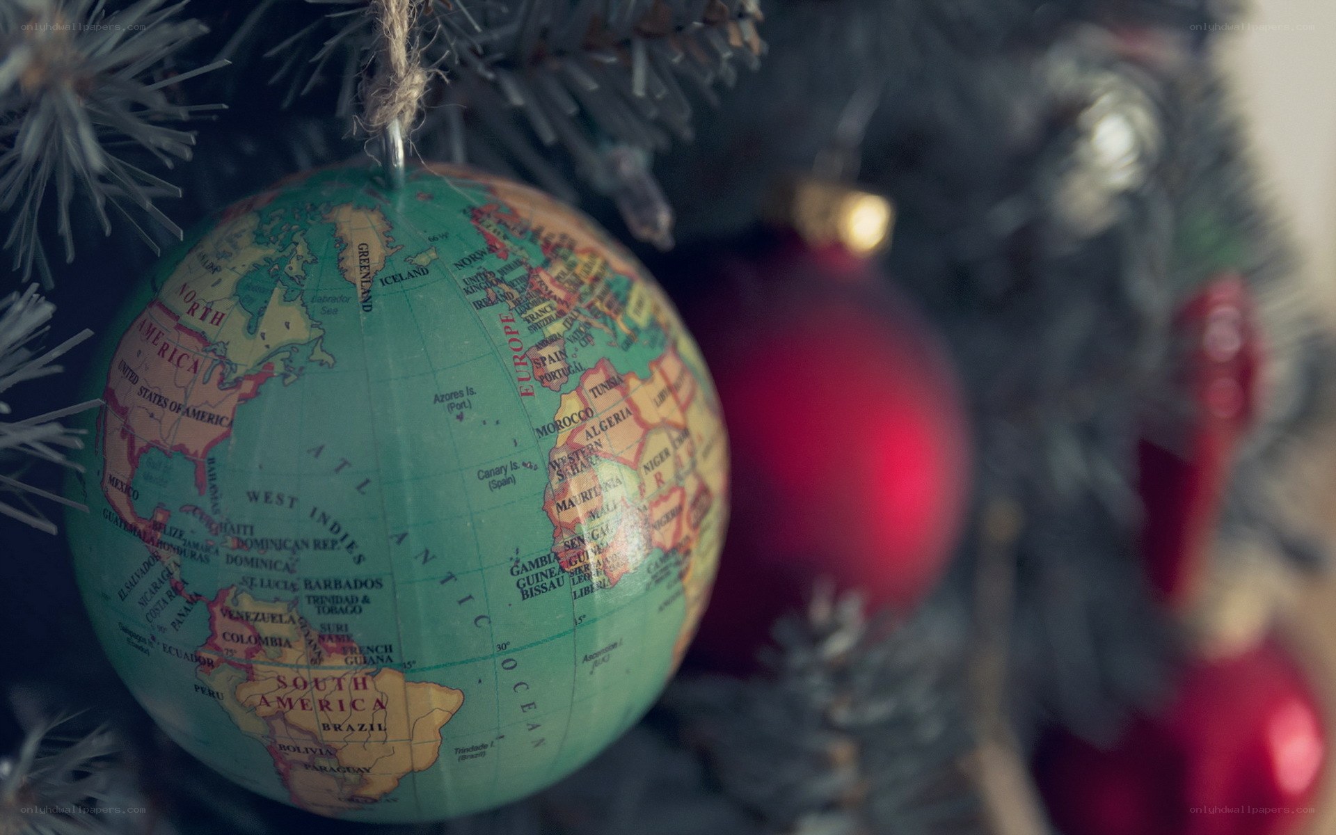 globe ornament on christmas tree