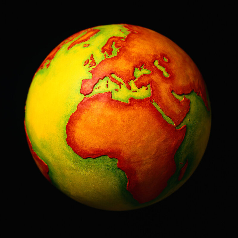 Globe with Colored Continents — Yellow, Dramatic