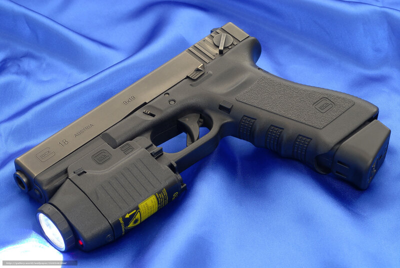 Glock 18 pistol with flashlight