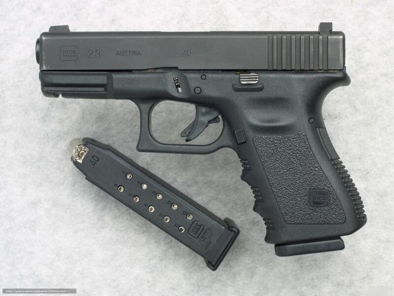 Glock 23 pistol with magazine