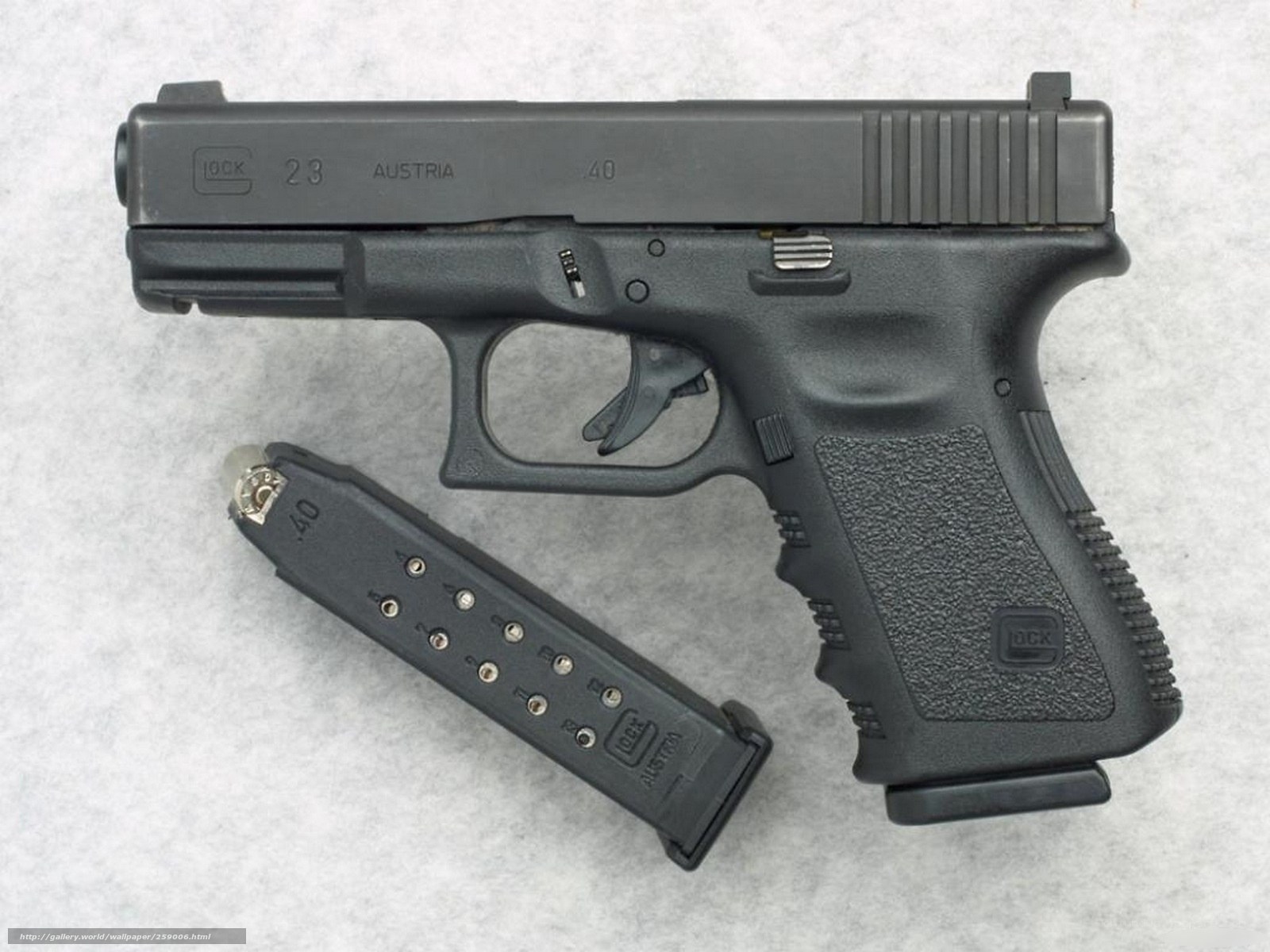 Glock 23 pistol with magazine