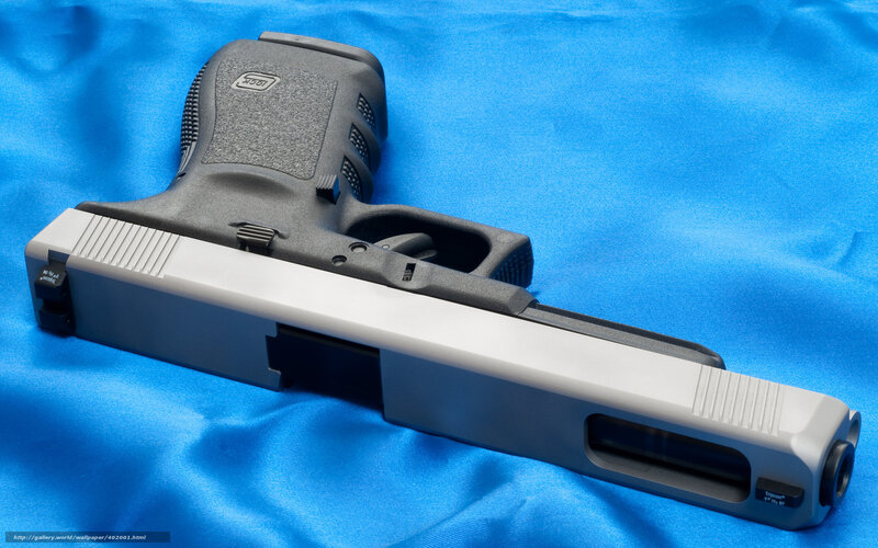 Glock Pistol on Blue Cloth