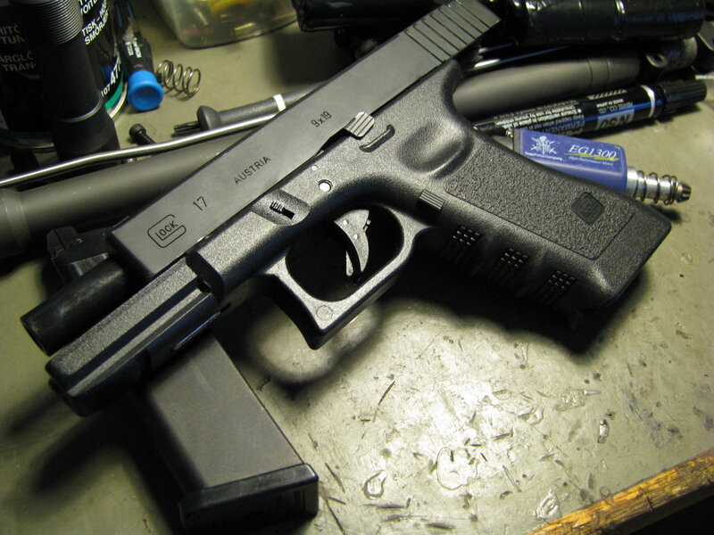 Glock pistol on workbench