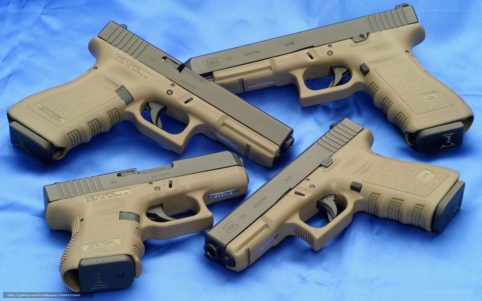 Glock pistols in tan finish
