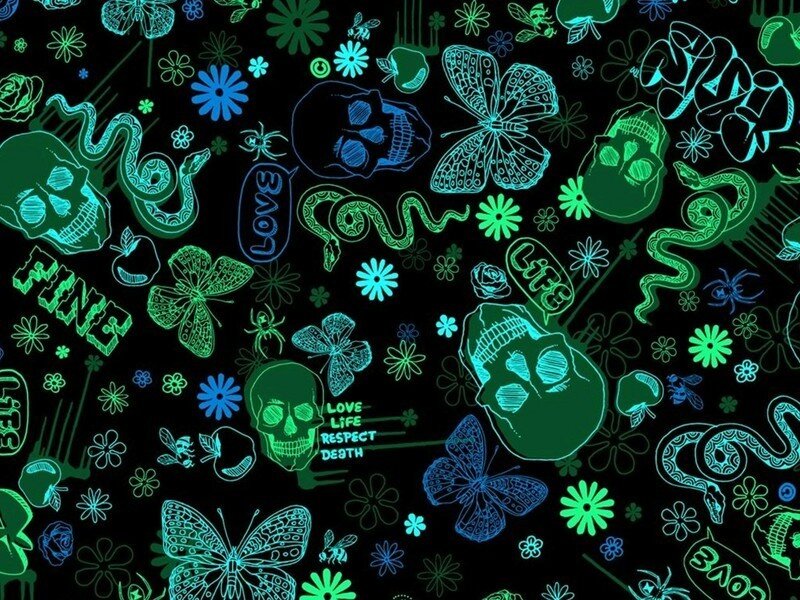 glow-in-the-dark pattern with skulls and snakes