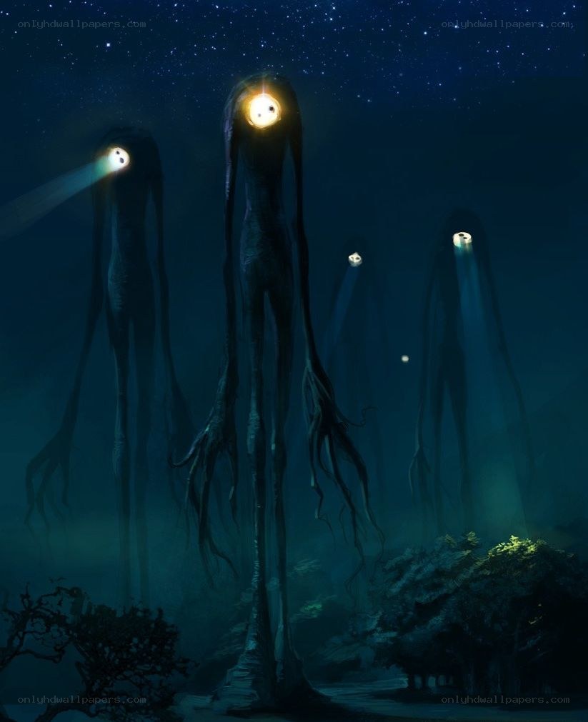 Glowing alien figures at night