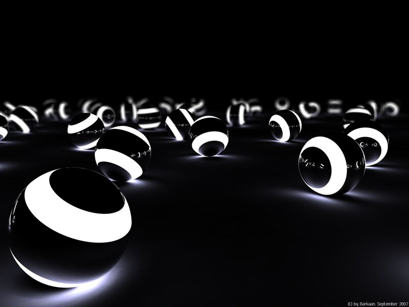 Glowing black and white spheres