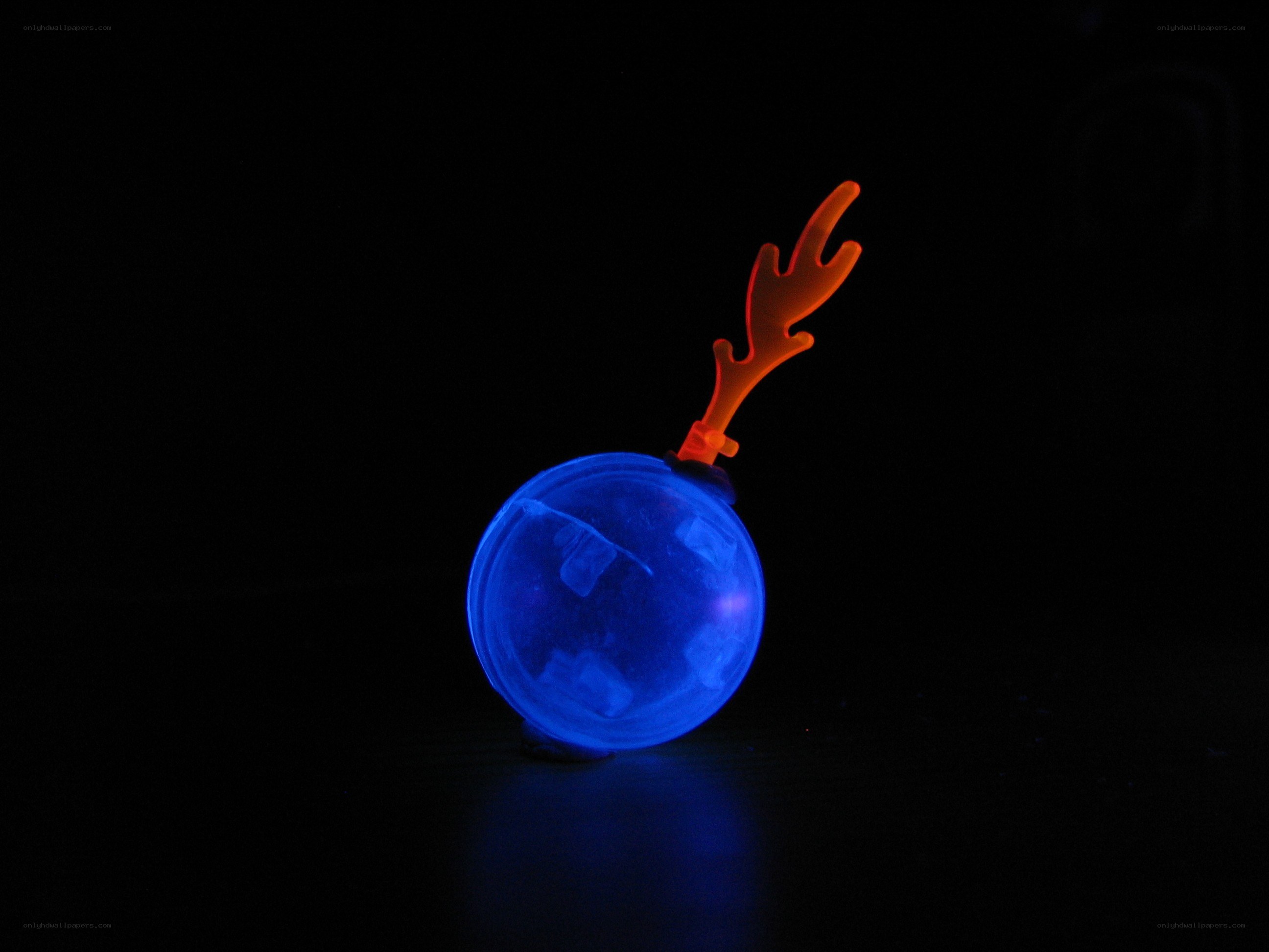 glowing blue ball with antlers