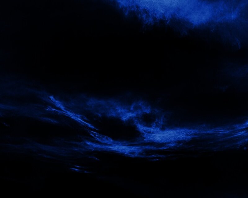 glowing blue clouds at night