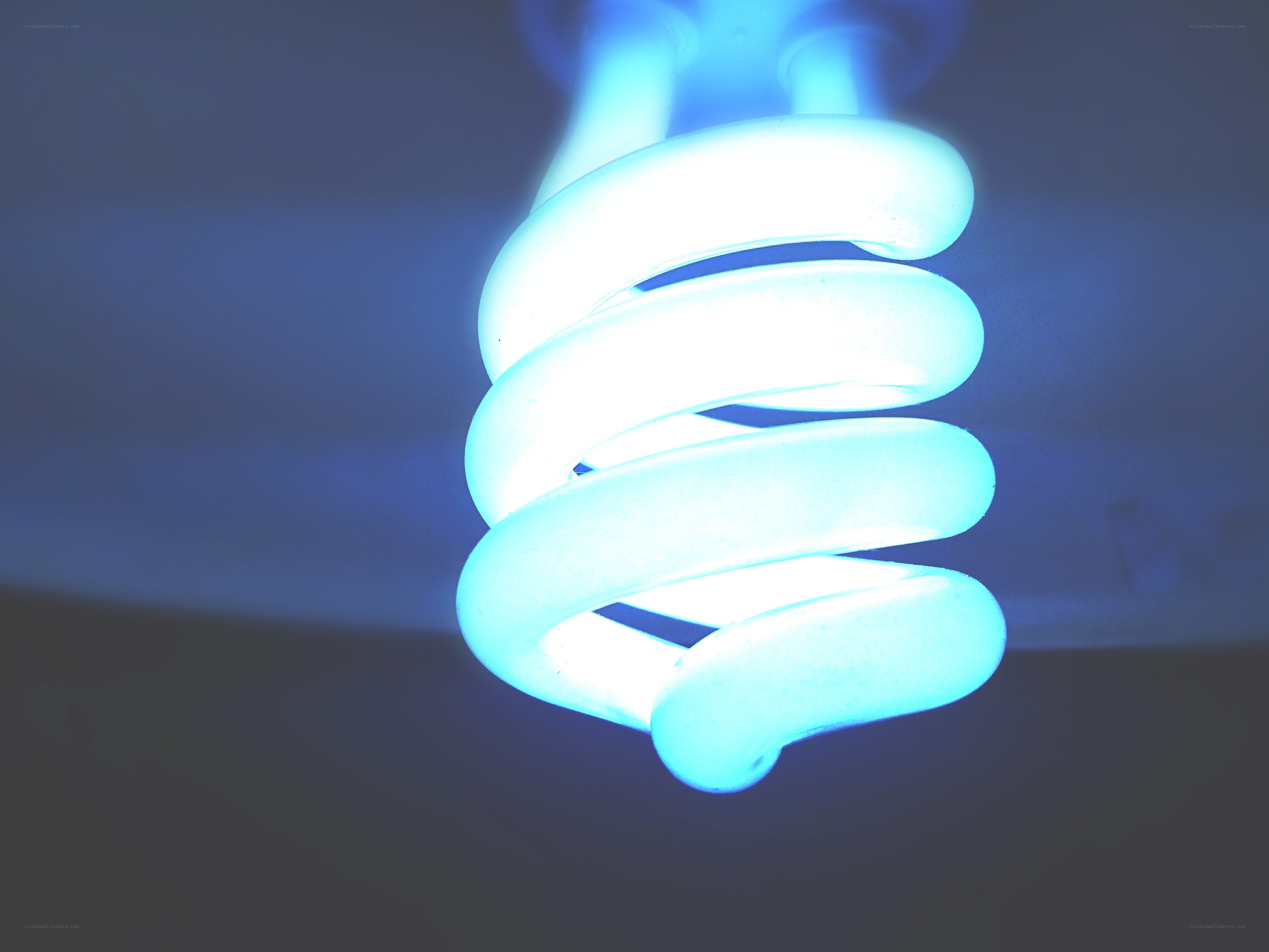 glowing blue light bulb