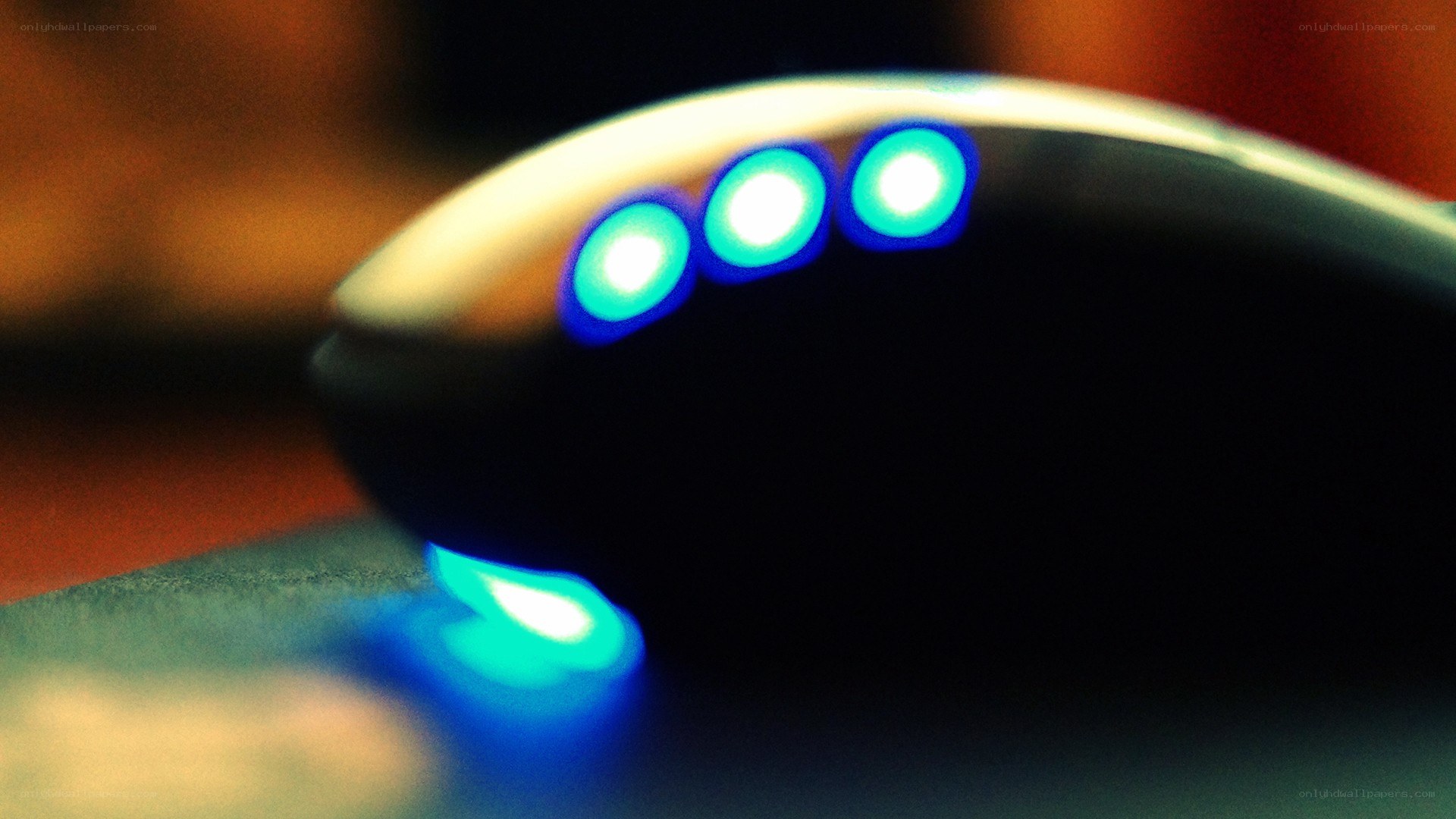 Glowing blue lights on a computer mouse