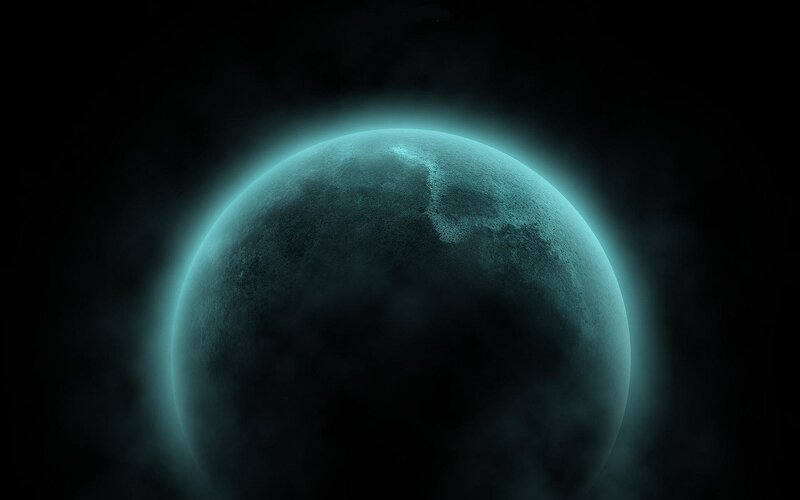 glowing blue planet in space
