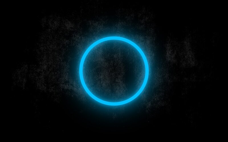 glowing blue ring on dark background