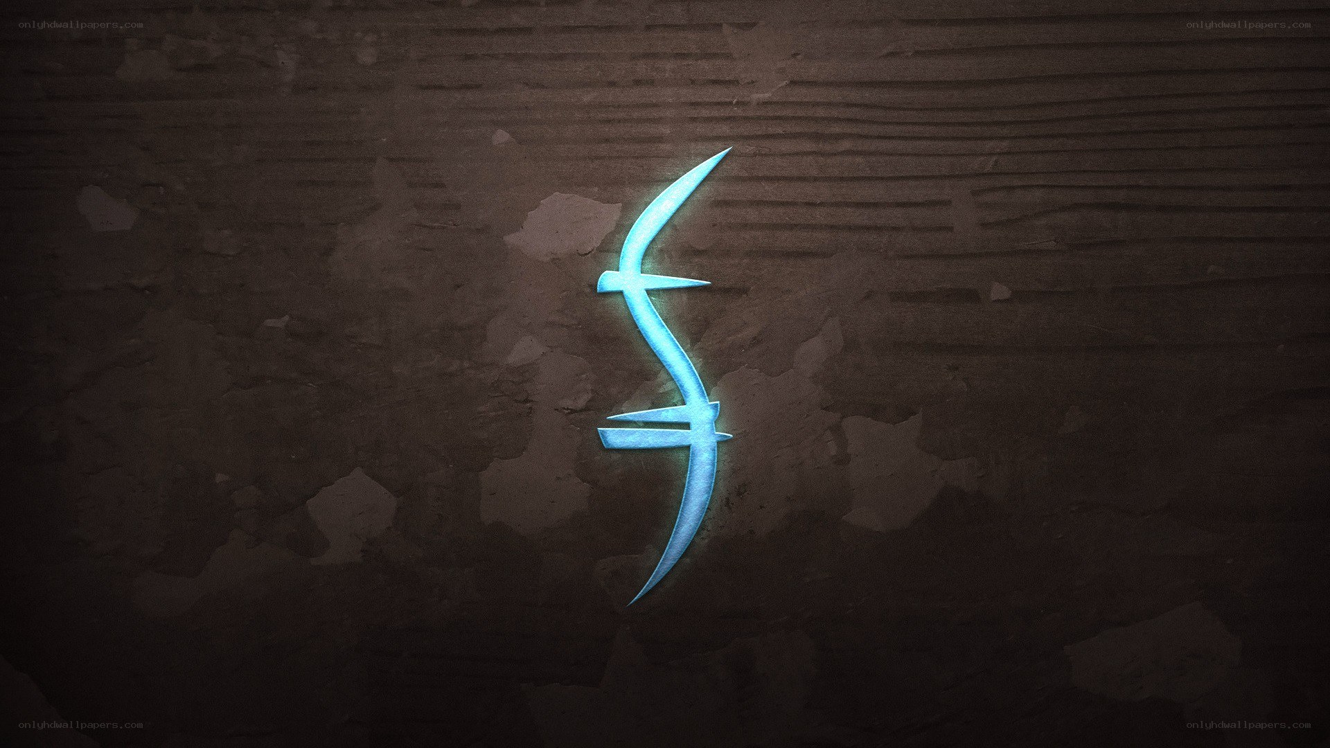 glowing blue symbol on wood