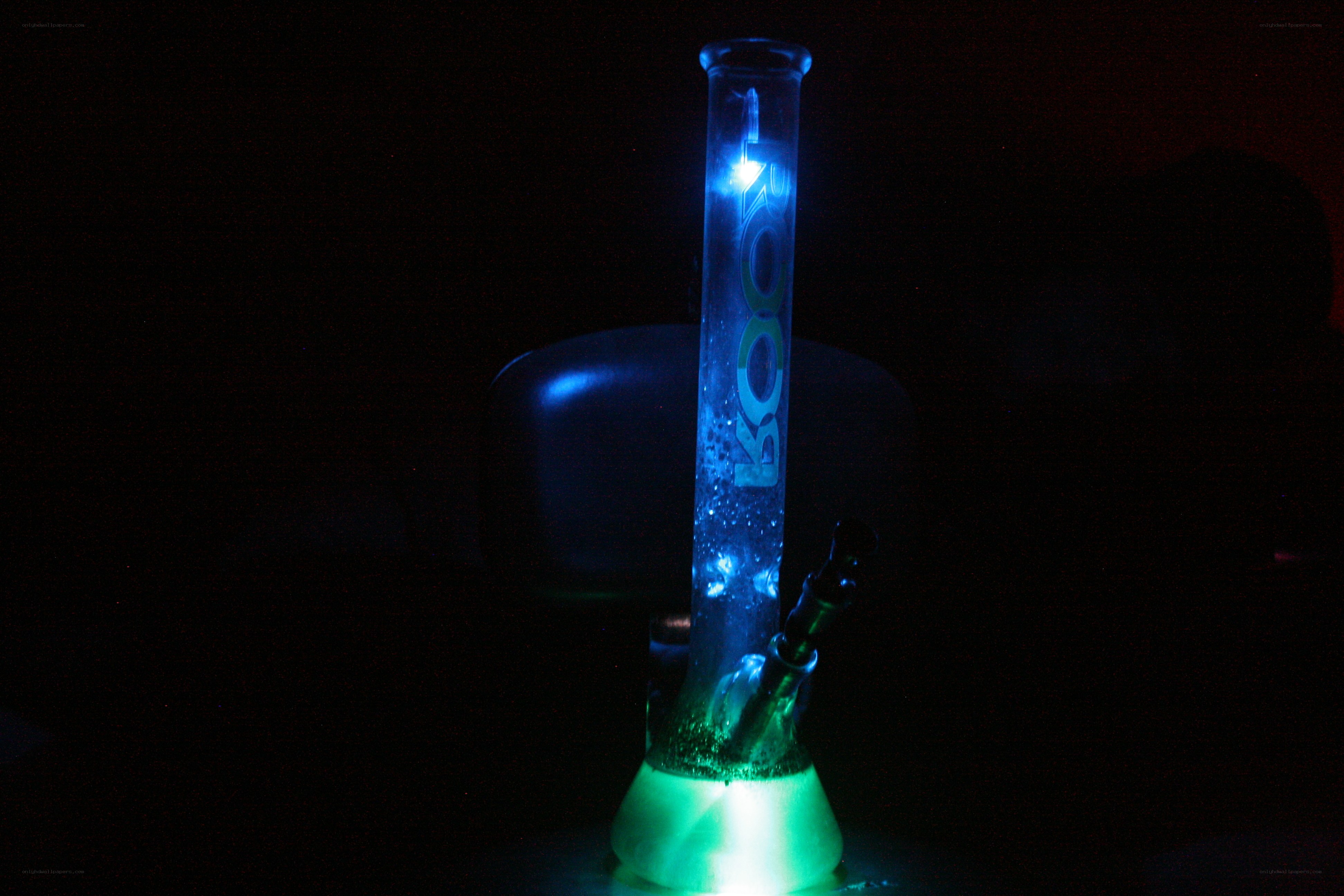 glowing bong in dark room