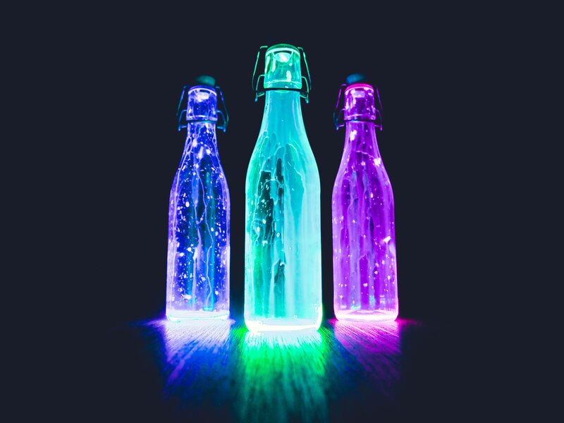 glowing bottles in dark