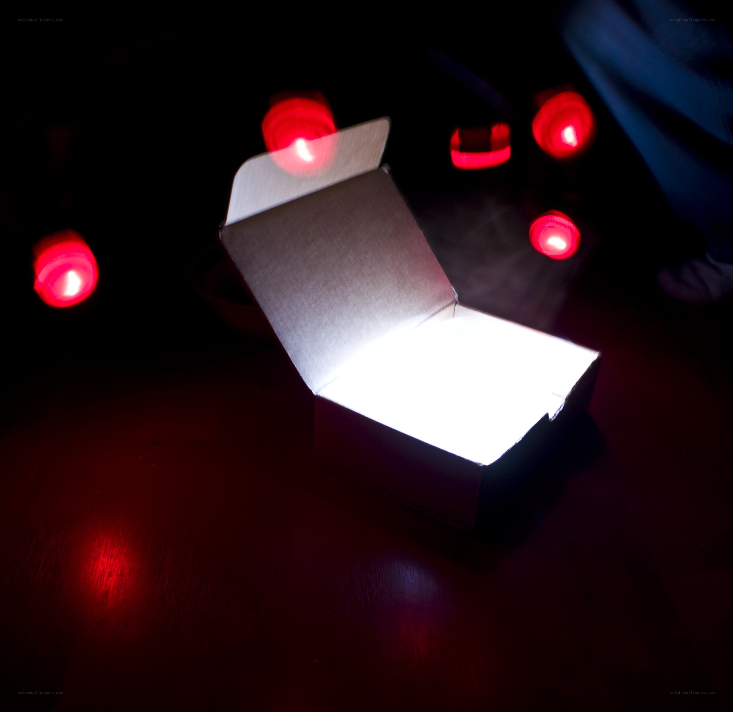 glowing box in dark room