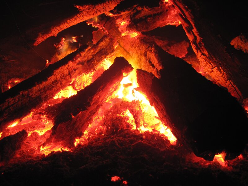 glowing campfire at night
