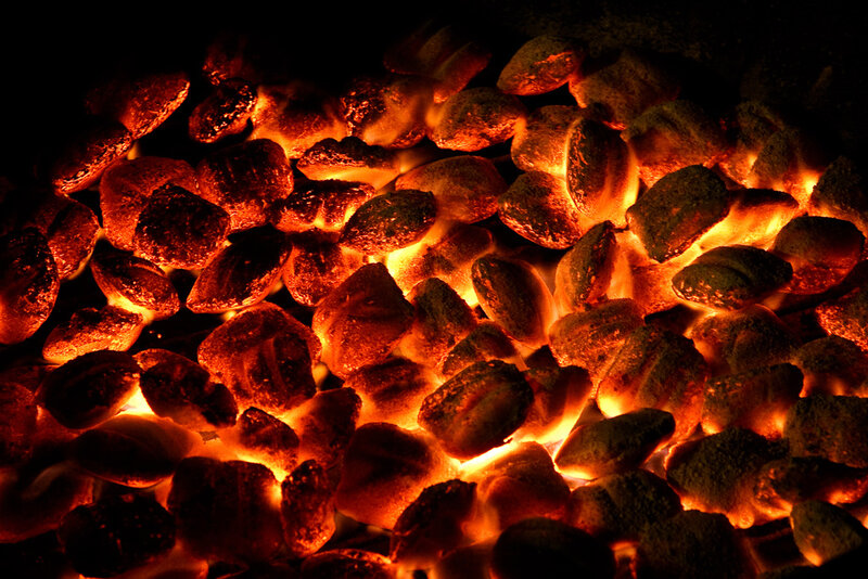 Glowing Charcoal Briquettes — Red