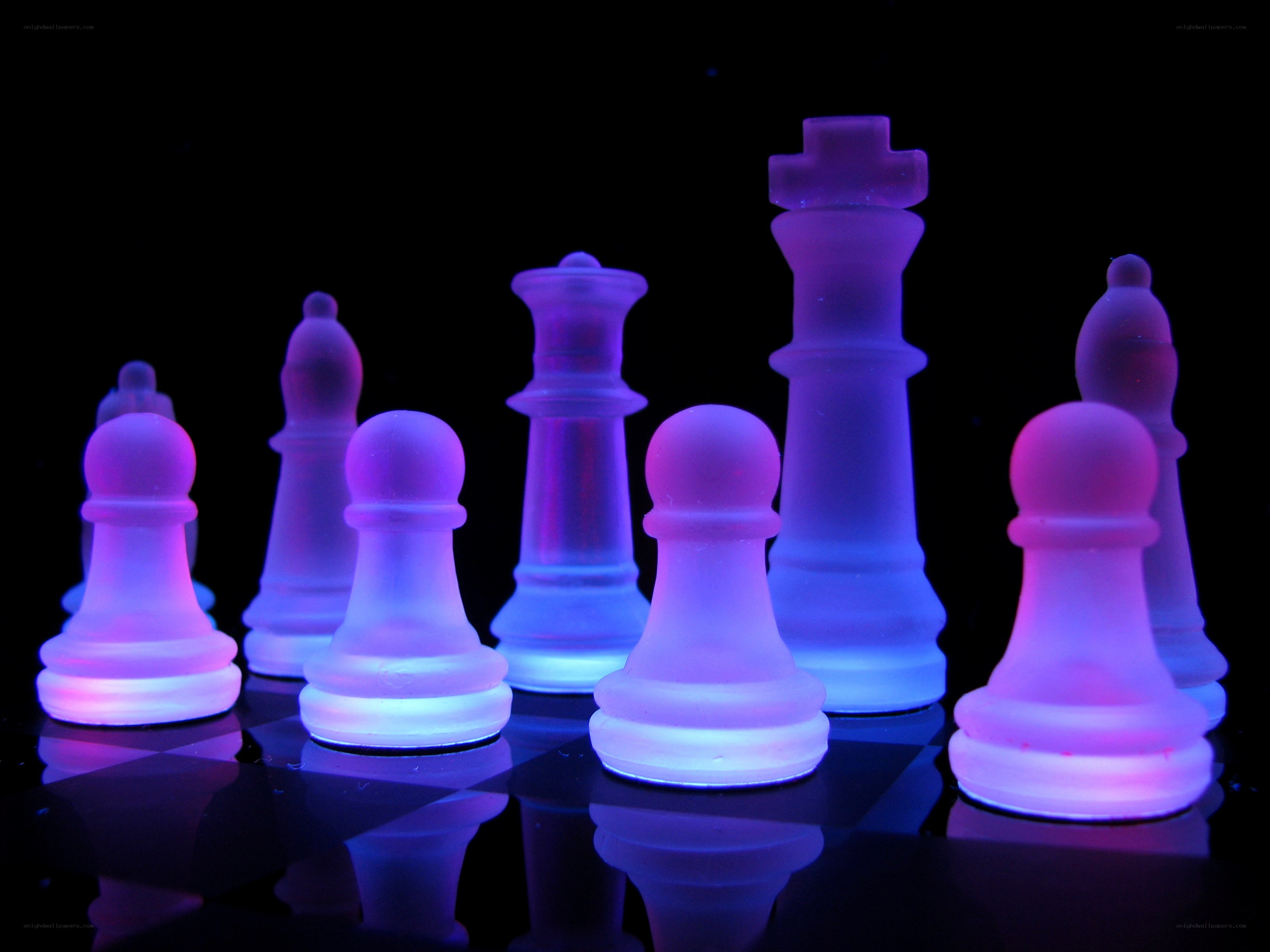 glowing chess pieces