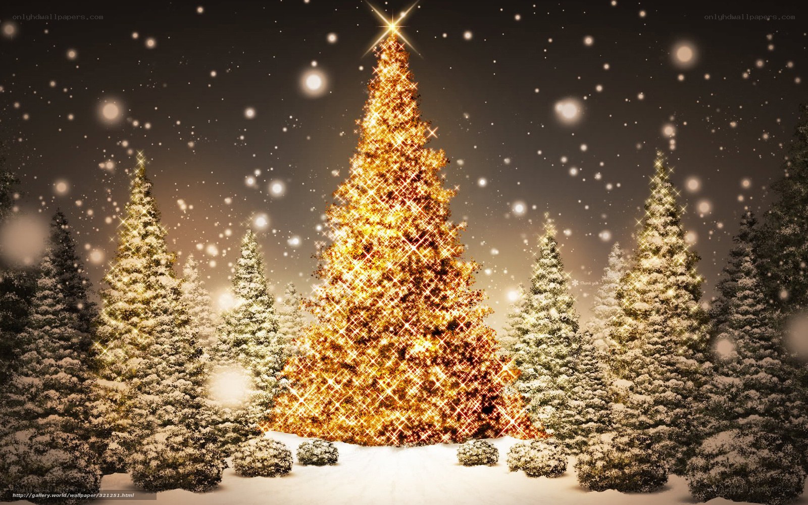 glowing christmas tree in snow