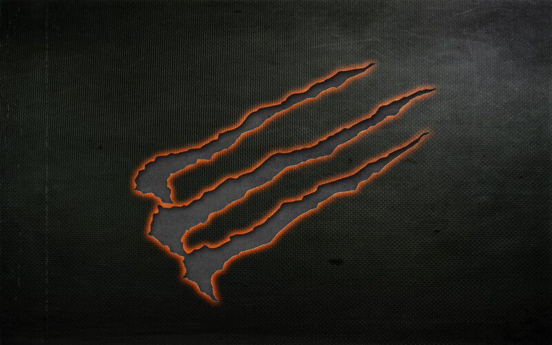 glowing claw marks on dark surface