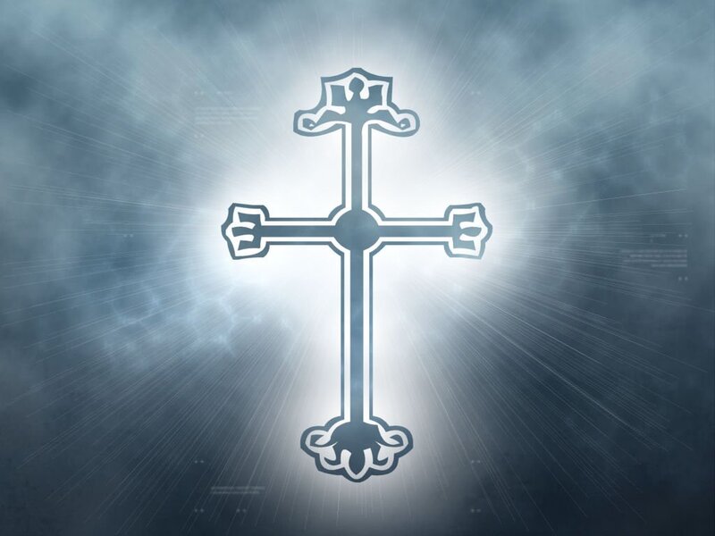 glowing cross in cloudy sky