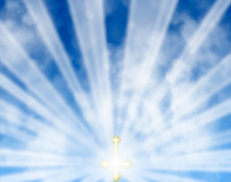 glowing cross in radiant sky
