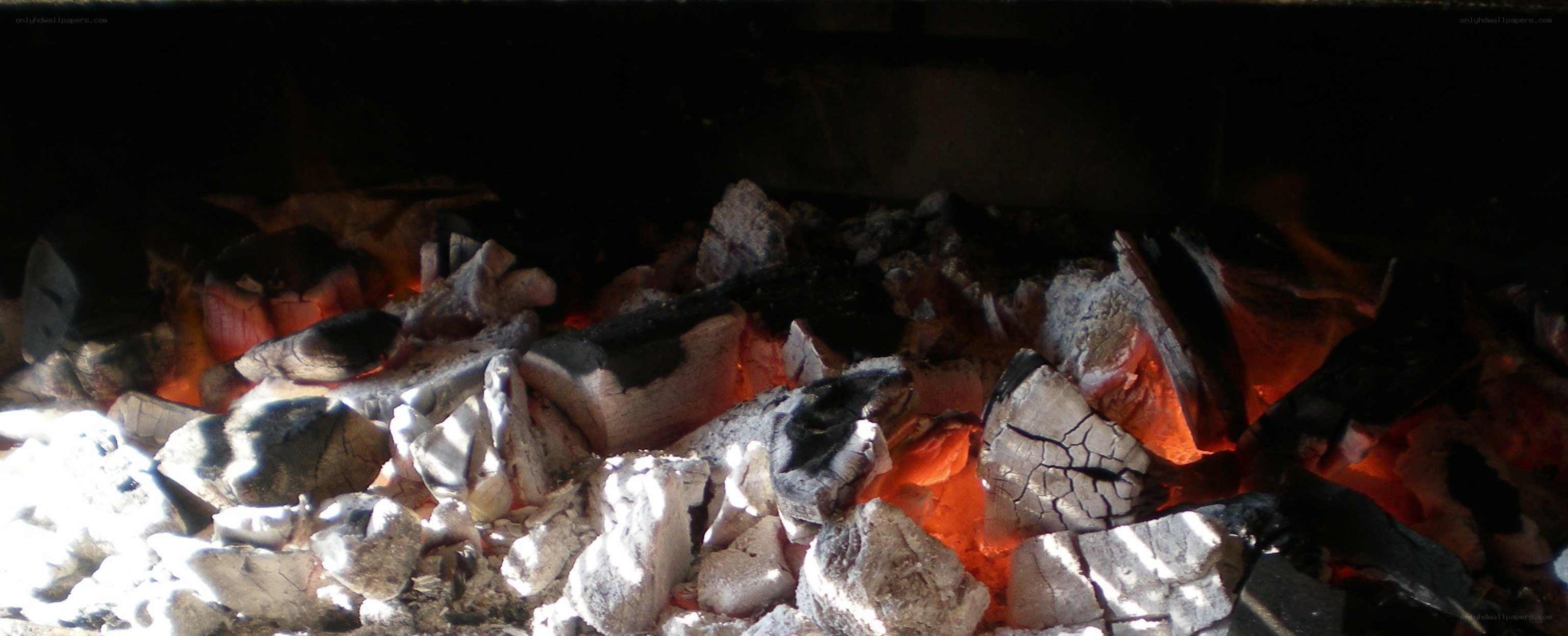 glowing embers in a fireplace