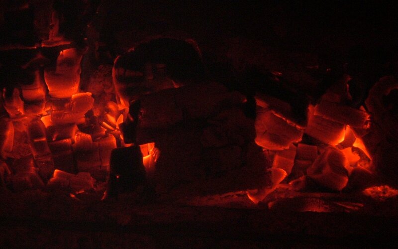 Glowing Embers in Darkness