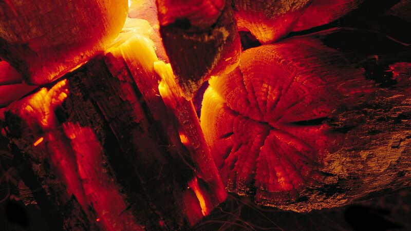 glowing embers of burning wood