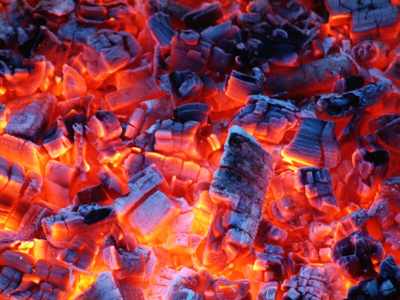 glowing embers of burning wood