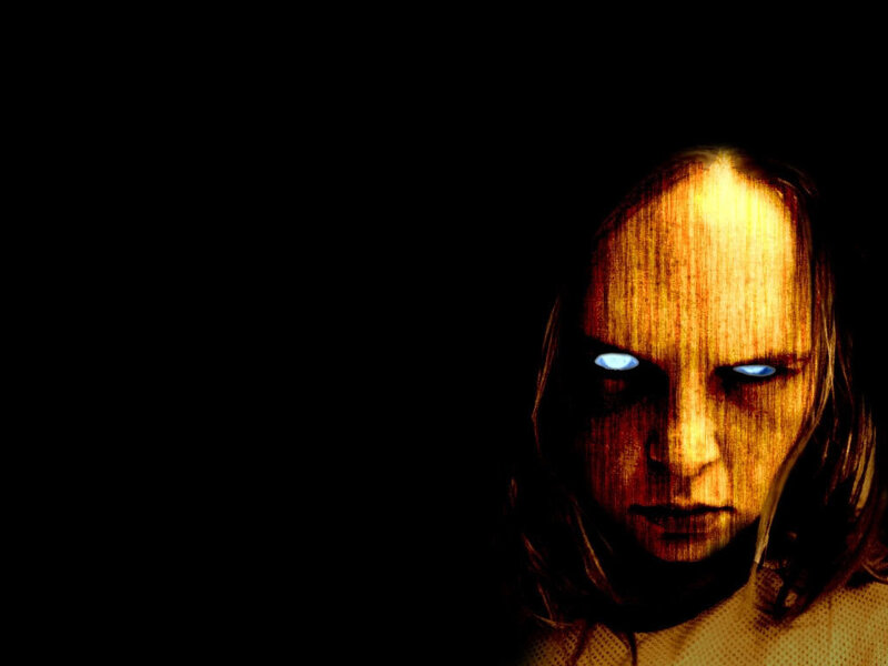 glowing eyes in darkness