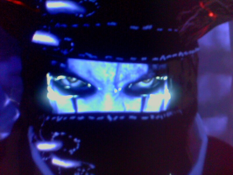 Glowing Eyes in Mask