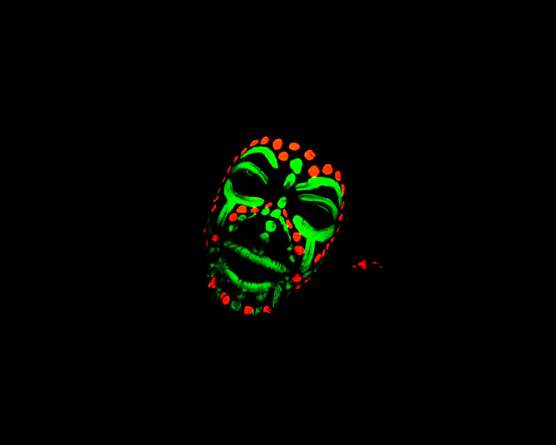 glowing face paint in dark