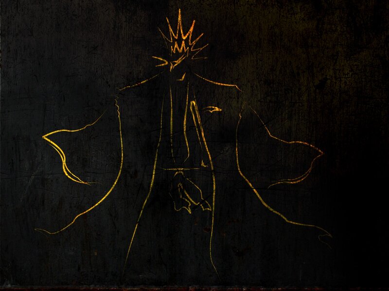 glowing figure on dark surface