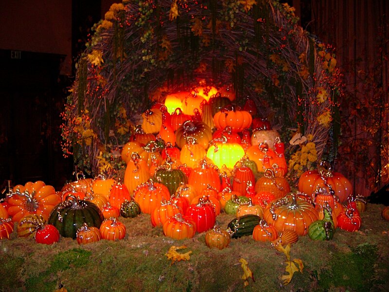 Glowing glass pumpkins display