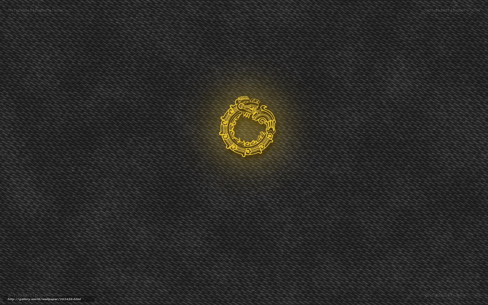 glowing golden emblem on dark texture