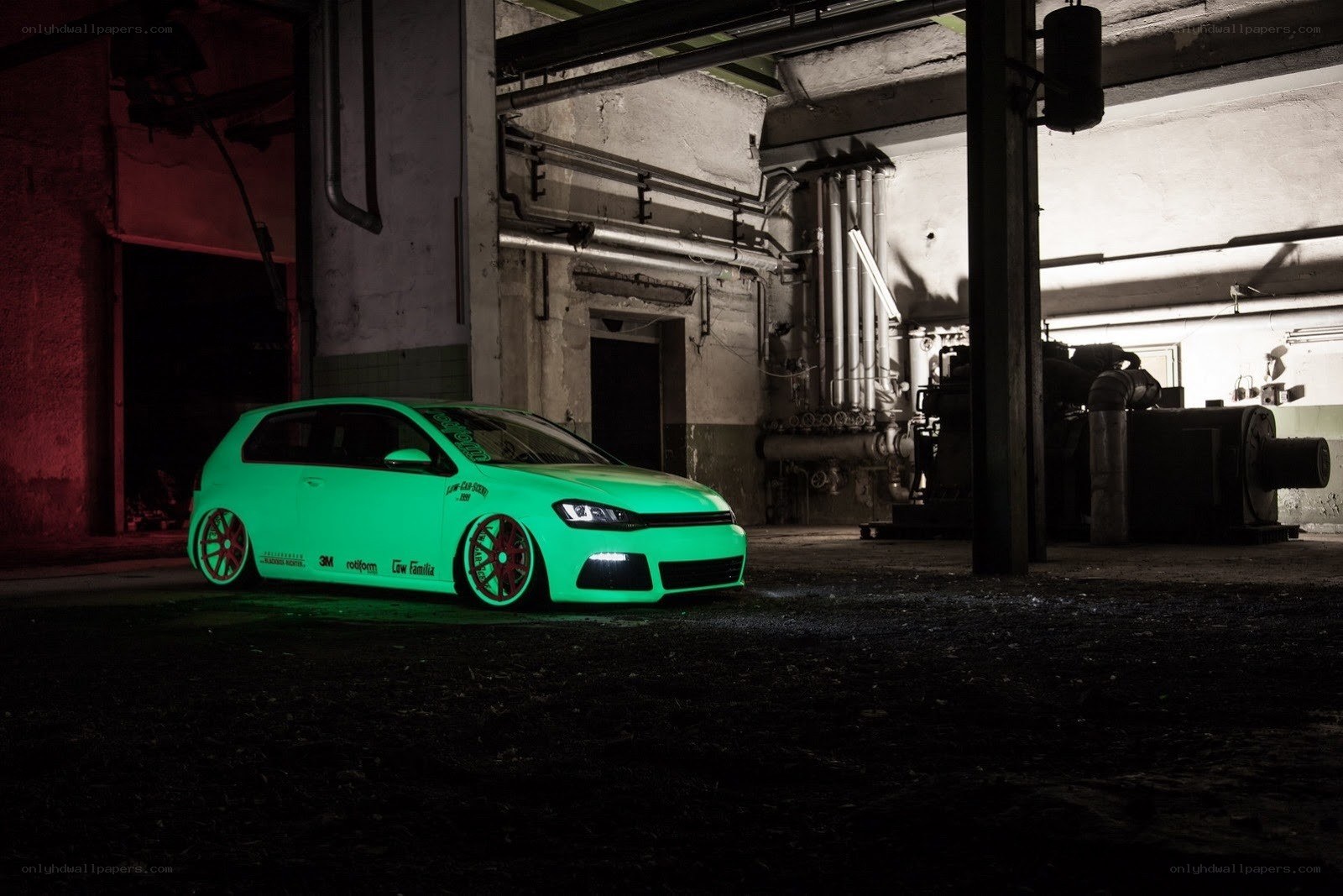 glowing green car in warehouse