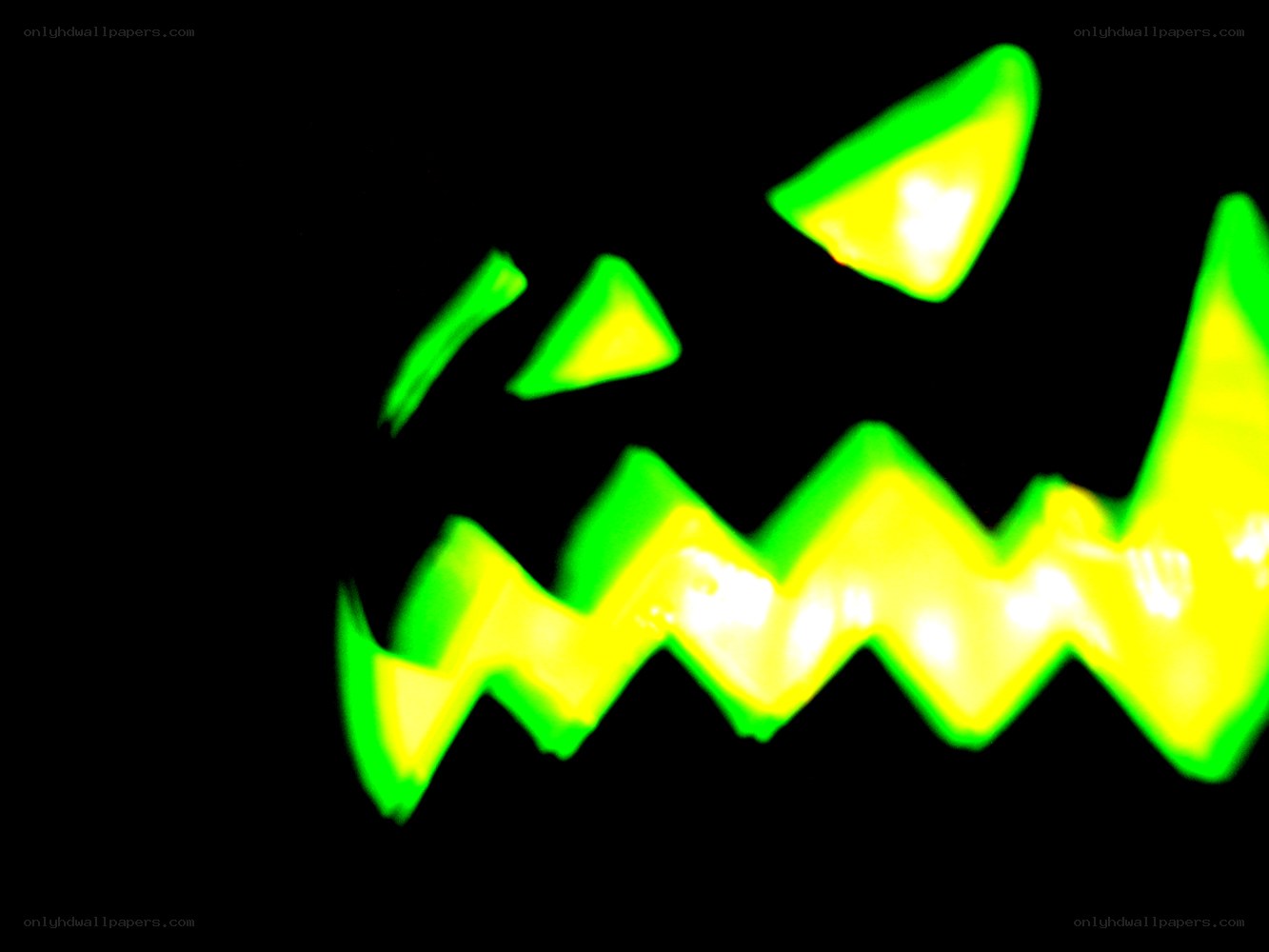 glowing green jack-o-lantern face