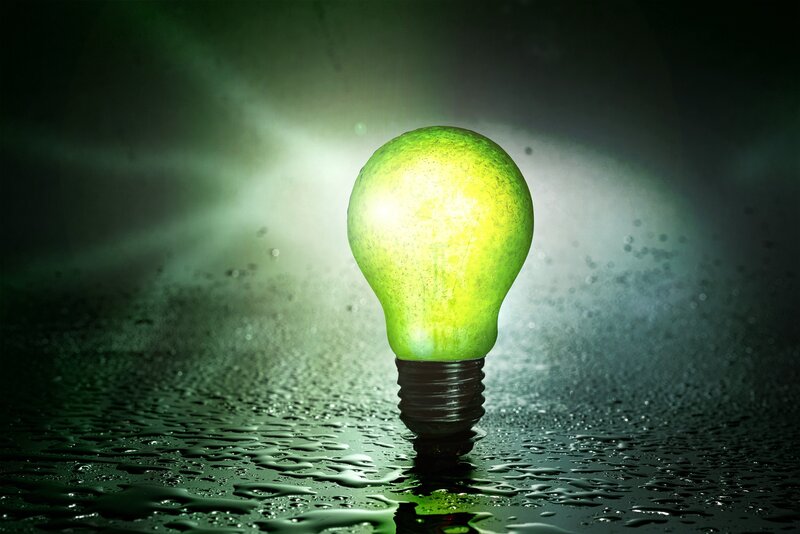 glowing green light bulb