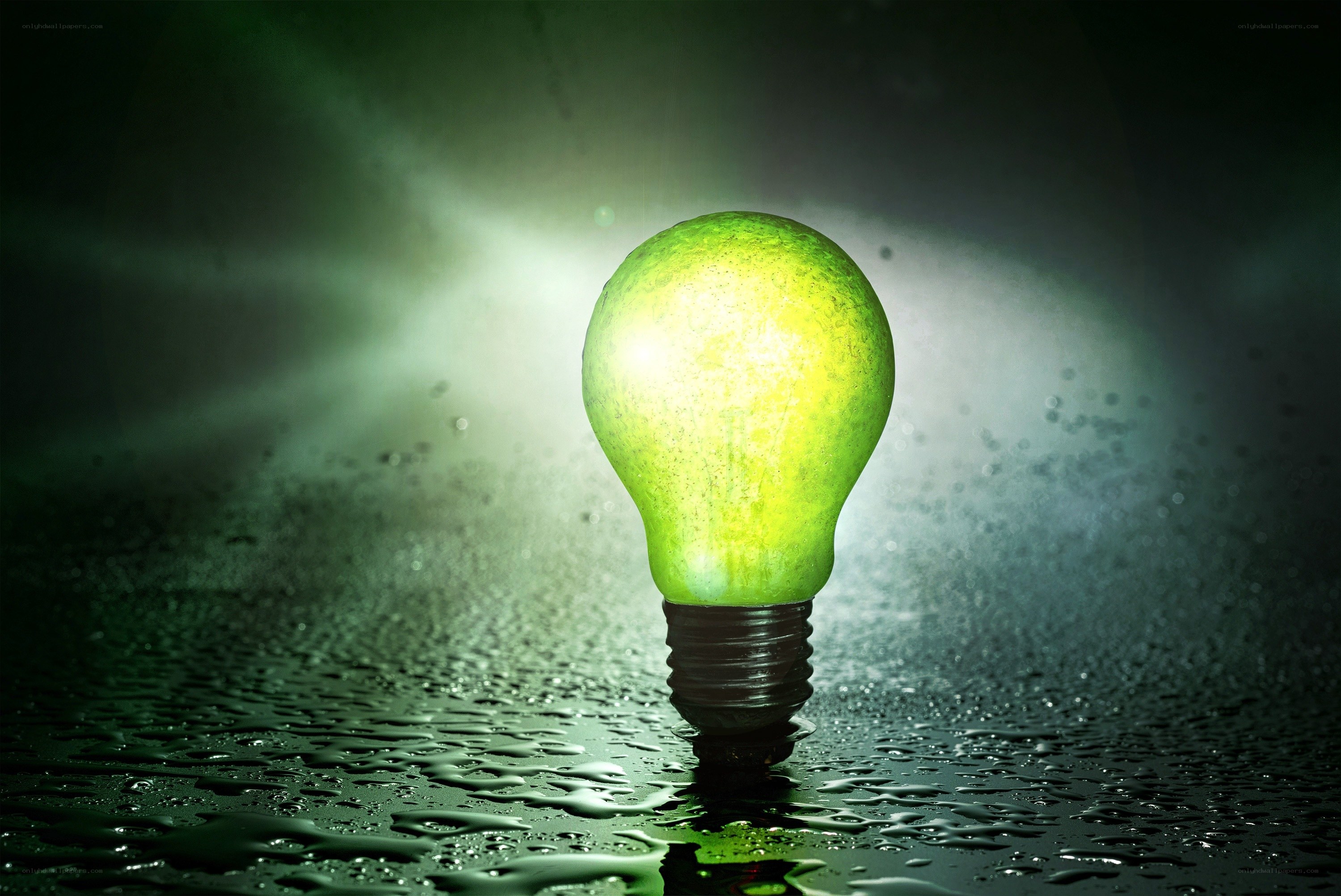 glowing green light bulb