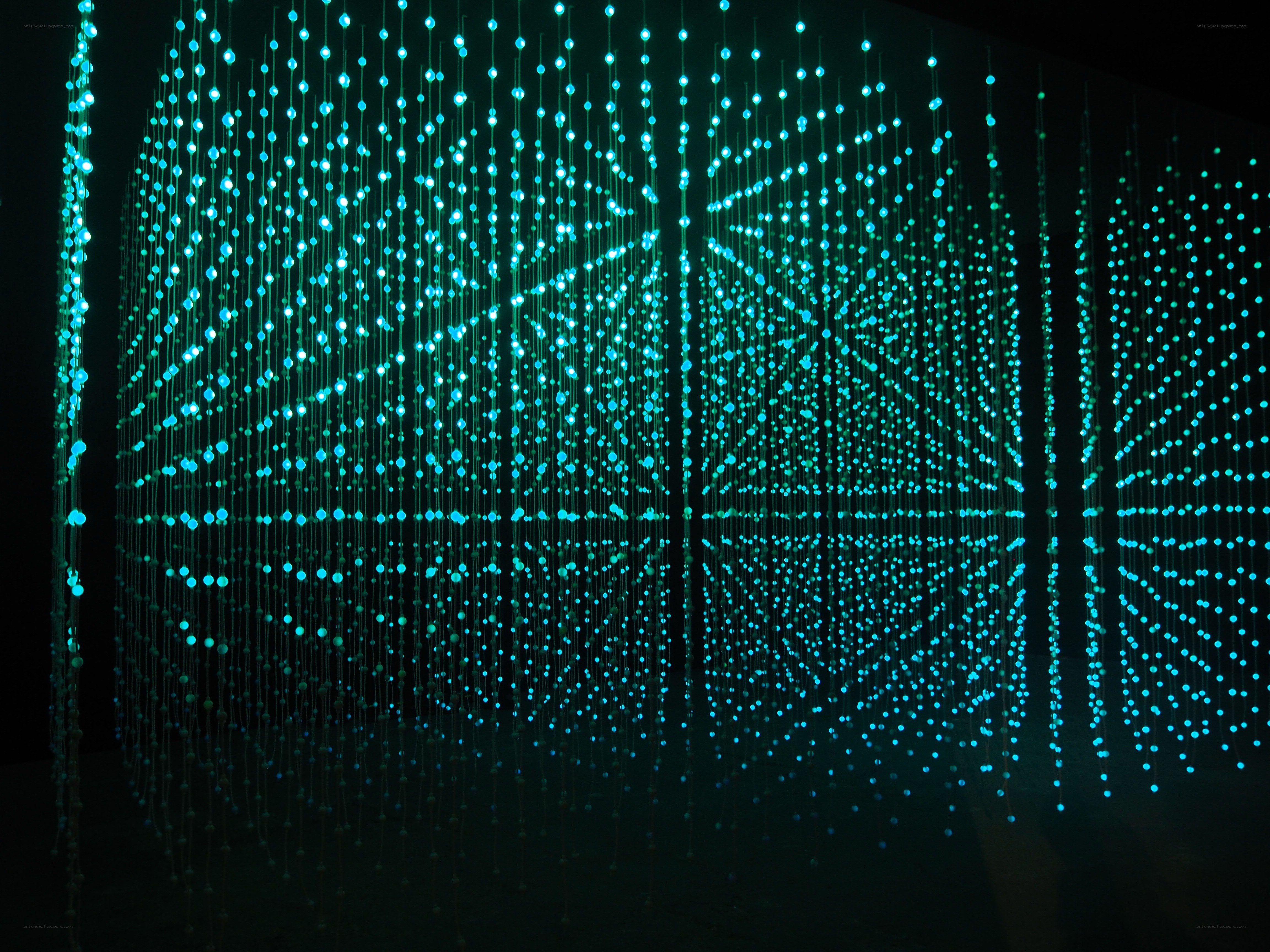 glowing green light installation