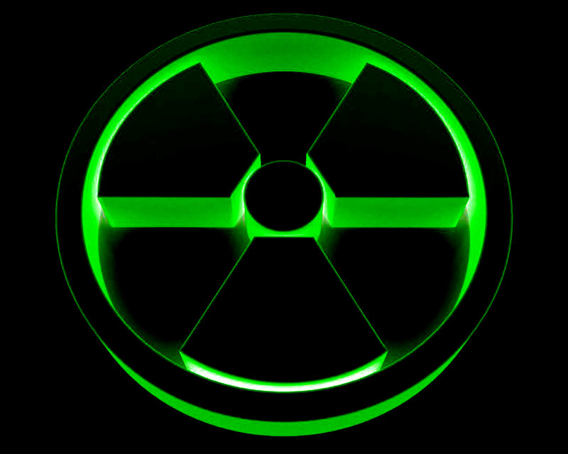 Glowing Green Radiation Symbol — Dramatic