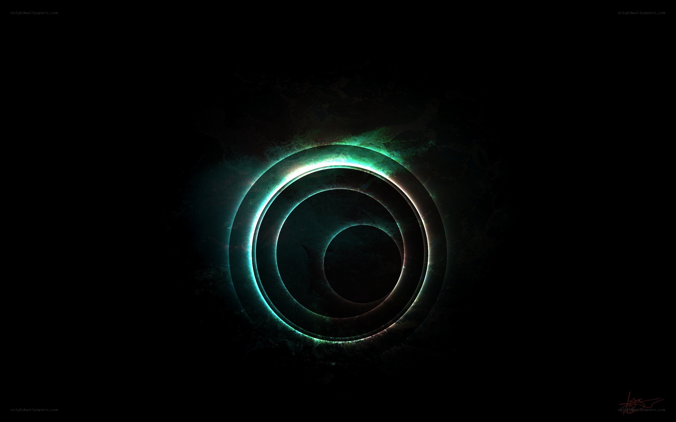 glowing green rings in darkness